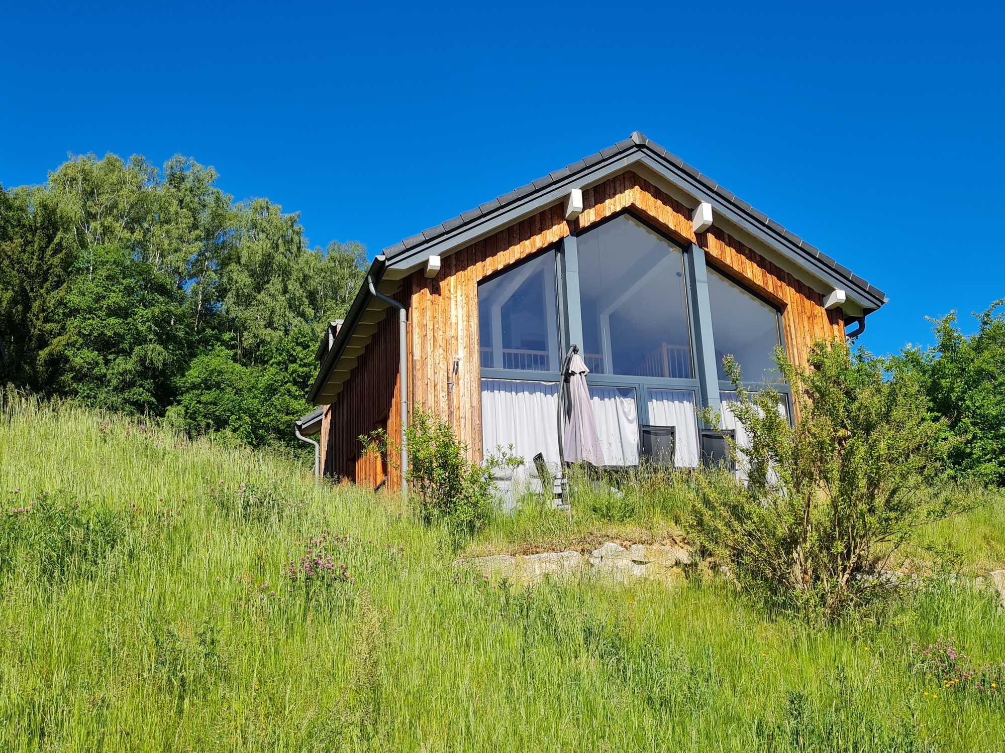 Ferienhaus im Feriendorf Obernsees mit Panoramafenstern